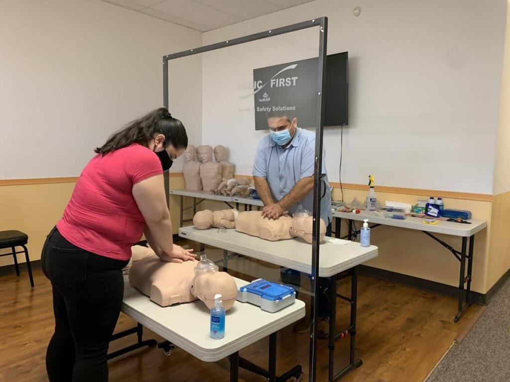 Medic First Aid CPR Hands On Training During Pandemic